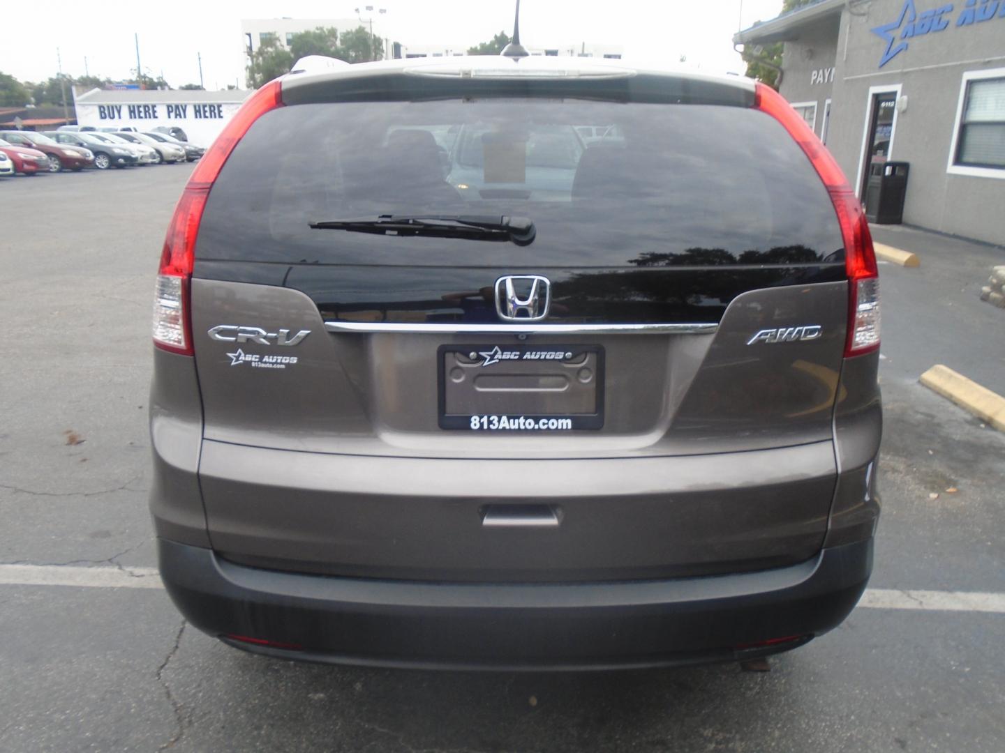 2013 Honda CR-V EX-L 4WD 5-Speed AT (5J6RM4H71DL) with an 2.4L L4 DOHC 16V engine, 5-Speed Automatic transmission, located at 6112 N Florida Avenue, Tampa, FL, 33604, (888) 521-5131, 27.954929, -82.459534 - Photo#4